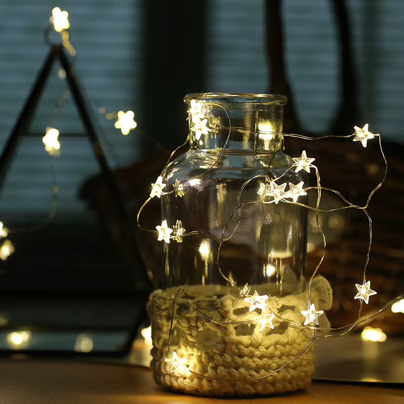 LED Lichterkette mit Stern und Schneeflocke Anhängern in Warmweiß und Transparent für Weihnachten, Hochzeit und Garten-Dekoration - Bild 2