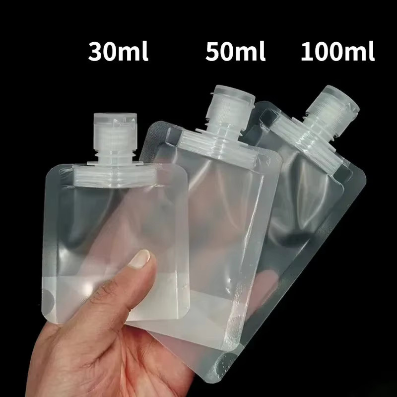 Transparente Clamshell-Standbeutel aus Kunststoff mit Ausgießer für Reiseflüssigkeiten wie Handdesinfektionsmittel, Lotion oder Shampoo - Bild 3