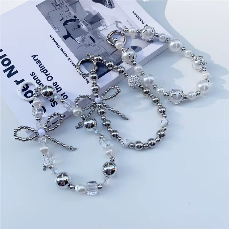 DOLANBIA Handgelenk Kette, Perle, Kristall, Strass, Unisex - Bild 1
