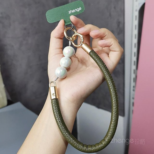 Rui Di Designer Handy-Lanyard aus geflochtenem Leder mit Perlenbesatz in Grün - Bild 1