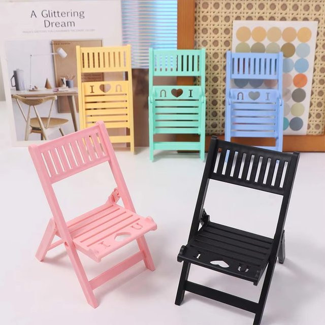 Multifunktionaler Macaron-Handyhalter aus Kunststoff in Stuhlform, faltbarer und tragbarer Handy-Ständer für deinen Schreibtisch in Weiß und Multicolour - Bild 1