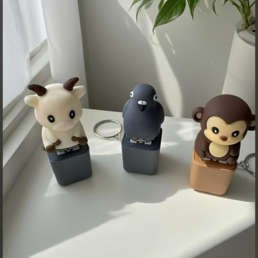 CDganmo Fidget Tier Klicker Schlüsselanhänger LED-Licht Stressabbau-Spielzeug - Bild 3