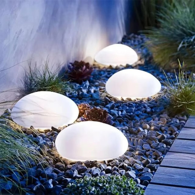 Leclstar LED-Solar-Gartenlampe in Kieselsteinoptik, moderne Bodenleuchte in Weiß mit warmweißem Licht für Garten und Wege - Bild 1