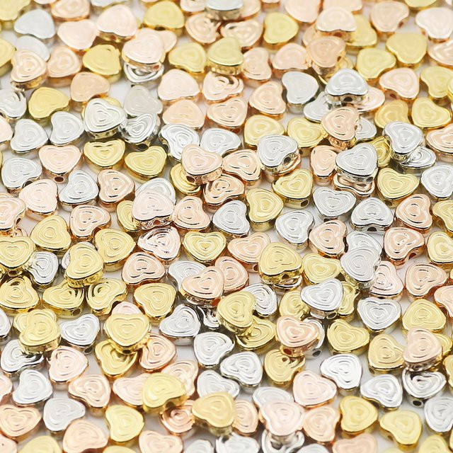 Spacer Perlen, doppelt herzförmig, 6 mm, goldene silbrige, Unisex - Bild 1