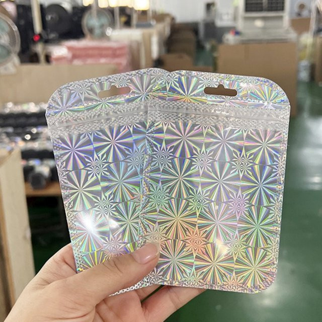 50 Stück Silber Laser OPP Beutel Holographische Selbstdichtende Verpackungsbeutel für Schmuck und Einzelhandel - Bild 1