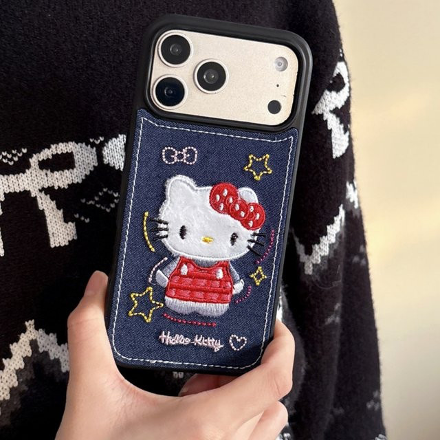 Sanrio Hello Kitty Handyhülle mit Denim-Leder-Muster und Herzchen-Sternen-Design in Blau für iPhone 17, 17 Pro, 15 und 14 Pro Max, stoßfest - Bild 1