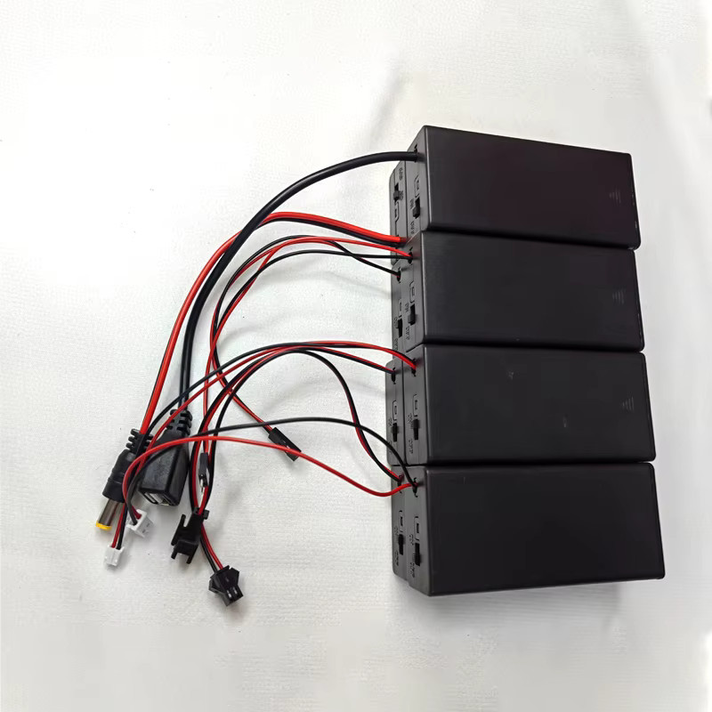 JCD 18650 Batteriehalterbox in Schwarz mit 2 Steckplätzen, Schalter, Abdeckung und Anschlüssen für PH2.0, XH2.54, DC5.5x2.1 und USB 2.0 - Bild 3