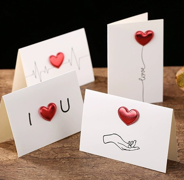 Weiße Liebeskarten und Umschläge aus Papier für Valentinstag und kleine Liebesnotizen - Bild 1