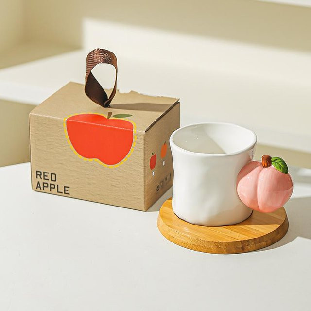Kreative Keramiktasse mit Apfel- und Pfirsich-Design in Orange und Weiß, 400 ml - Bild 1