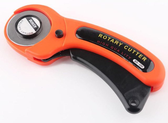 Rollschneider für Stoff, Gummi und Leder mit sicherer Verriegelung, 45 mm, Orange - Bild 1