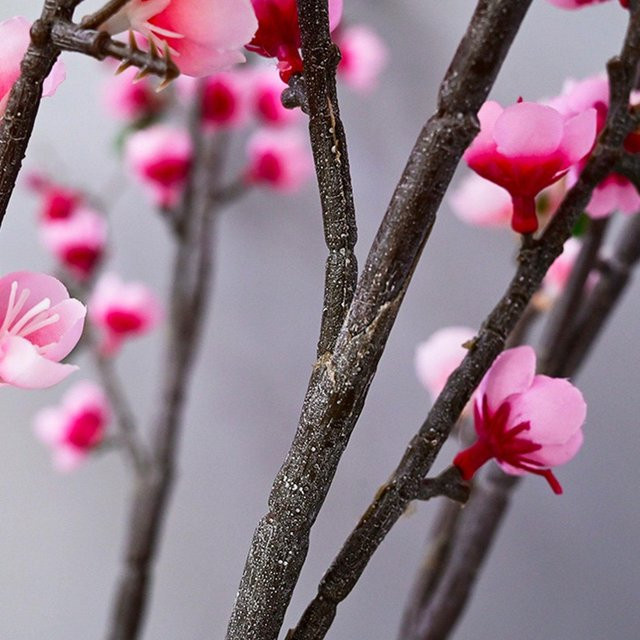 Künstliche Pfirsichblüten und Pflaumenblüten von KONNWEI in Rosa und Grau für deine Innen- oder Außendekoration - Bild 1