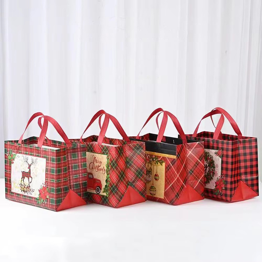 Runtow 4-teiliges Geschenktüten-Set aus Vlies mit Weihnachtsmotiv und Griffen - Bild 2