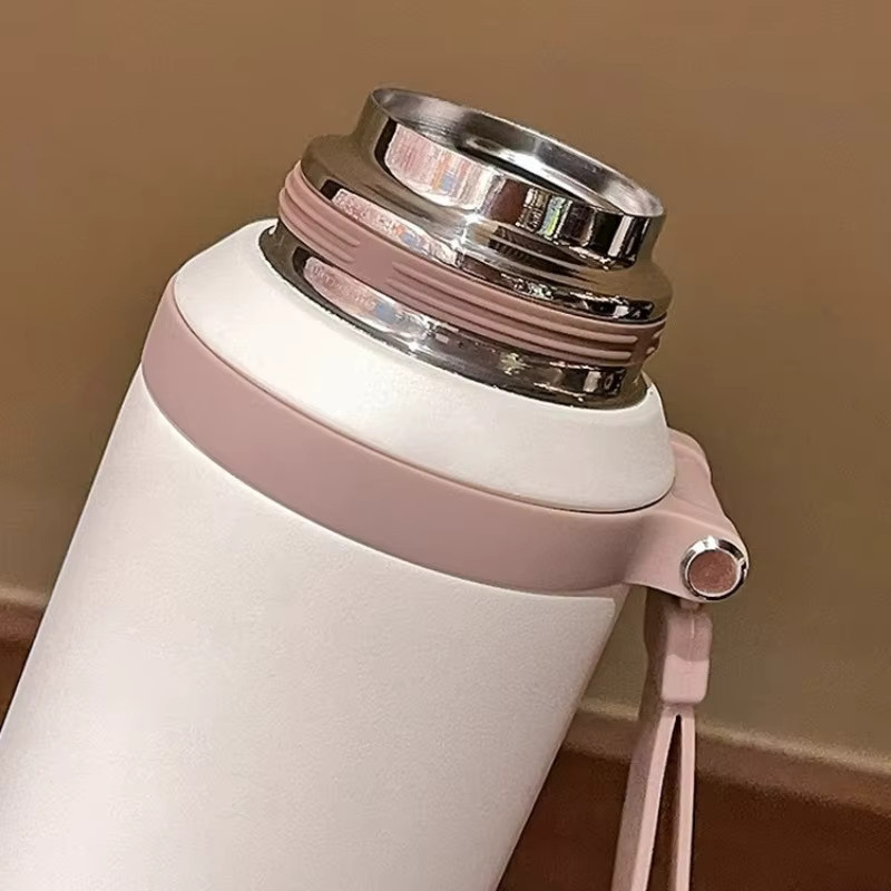 JUSTINLAU Thermoskanne mit Teesieb aus Edelstahl in Weiß, 600/800 ml Isolierflasche für unterwegs - Bild 4