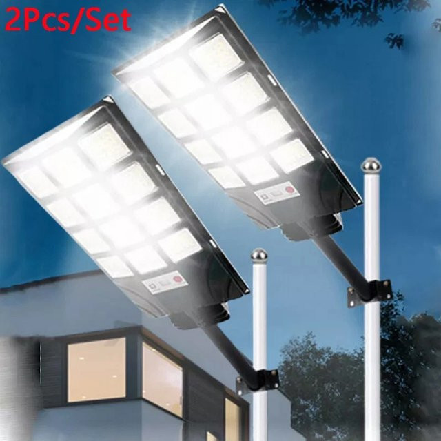 UMEXUS LED Solar Wandlampe Set mit Bewegungssensor, 2er Pack, Schwarz, IP65 wasserdicht, 3000LM Outdoor Garten Scheinwerfer mit kühlem Weißlicht - Bild 1