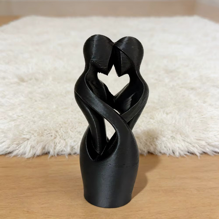 Minimalistische Skulptur ineinander verschlungener Liebhaber als Tischdekoration in Schwarz oder Weiß - Bild 2