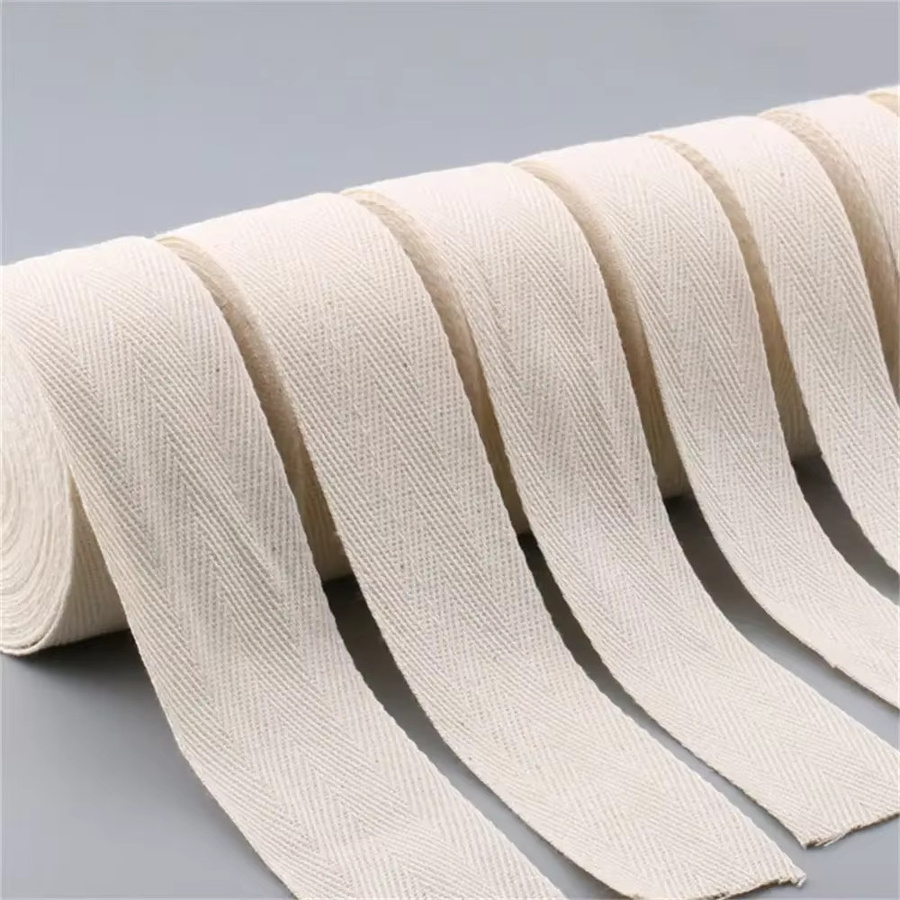 Baumwoll-Kantenbindeband mit Fischgrätenmuster in Weiß und Beige, 50 m Rolle, Breite: 3 cm - Bild 1