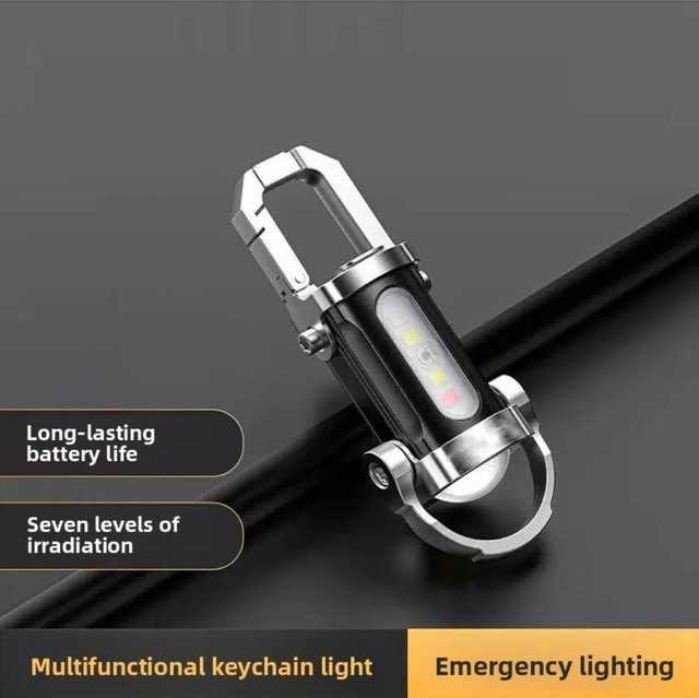 Tragbare Mini-Schlüsselanhänger-Taschenlampe in Silber als wasserdichtes Multifunktions-Notlicht mit wiederaufladbarem Akku - Bild 1