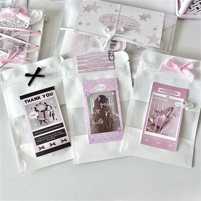 10 Stück weiße Kraftpapiertüten für Fotos, Karten und Schmuck als Geschenkverpackung - Bild 1