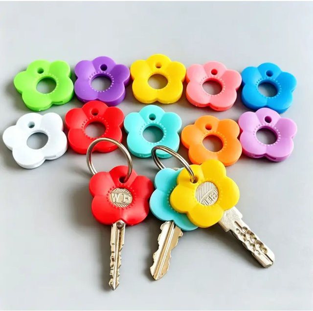 8-teiliges farbcodiertes Schlüsselschutzetui aus Kunststoff in Multicolor für Haus- und Büroschlüssel - Bild 1