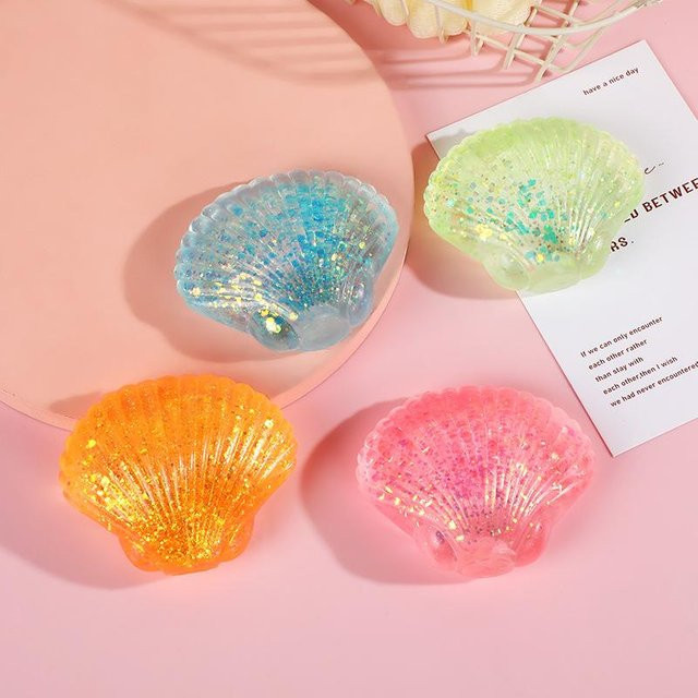 BC Pet Supplies Glitzer-Muschel Squishy Stressball, bunt - Bild 1