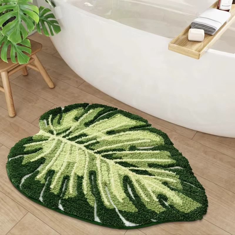 VIKAMA Badezimmer-Fußmatte mit tropischen grünen Blättern, weiche und rutschfeste Plüschmatte für Dusche und Badewanne in Grün - Bild 1