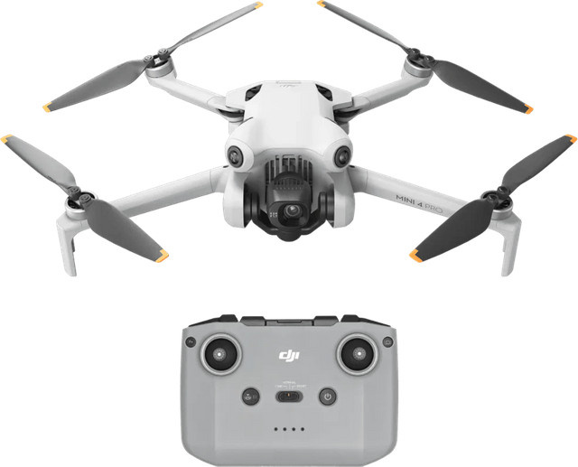 DJI Mini 4 Pro Drohne mit RC Controller in Grau - Bild 1