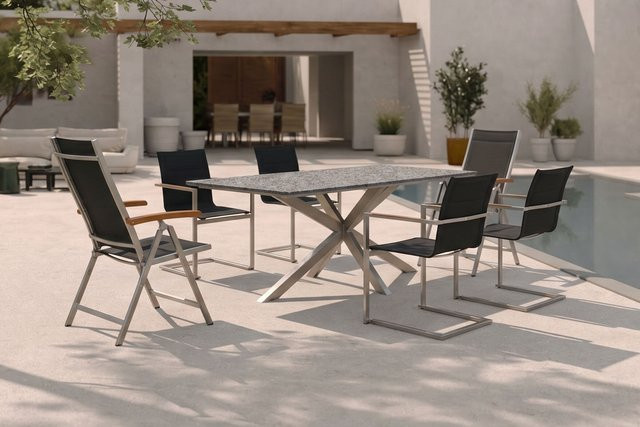 OUTFLEXX Garten-Essgruppe aus Edelstahl, Granit und Textil in Silber und Schwarz mit 4 Freischwingern, 2 Klappstühlen und Teak-Armlehnen, Tischbreite: 200 cm, Tischtiefe: 100 cm - Bild 1
