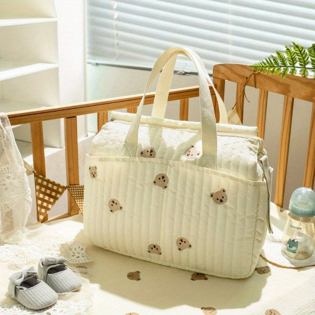 Multifunktionale Wickeltasche movokbaby mit Stickerei und Kinderwagen-Halterung, Farbe: Grün - Bild 1