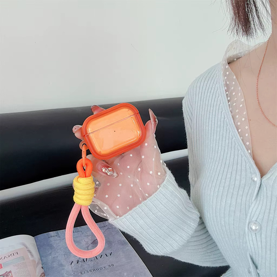 Stoßfeste halbtransparente Schutzhülle für Apple AirPods 1, 2, 3, 4 und Pro 2 mit gewebtem Schlüsselband und Anhänger in Transparent und Weiß - Bild 2