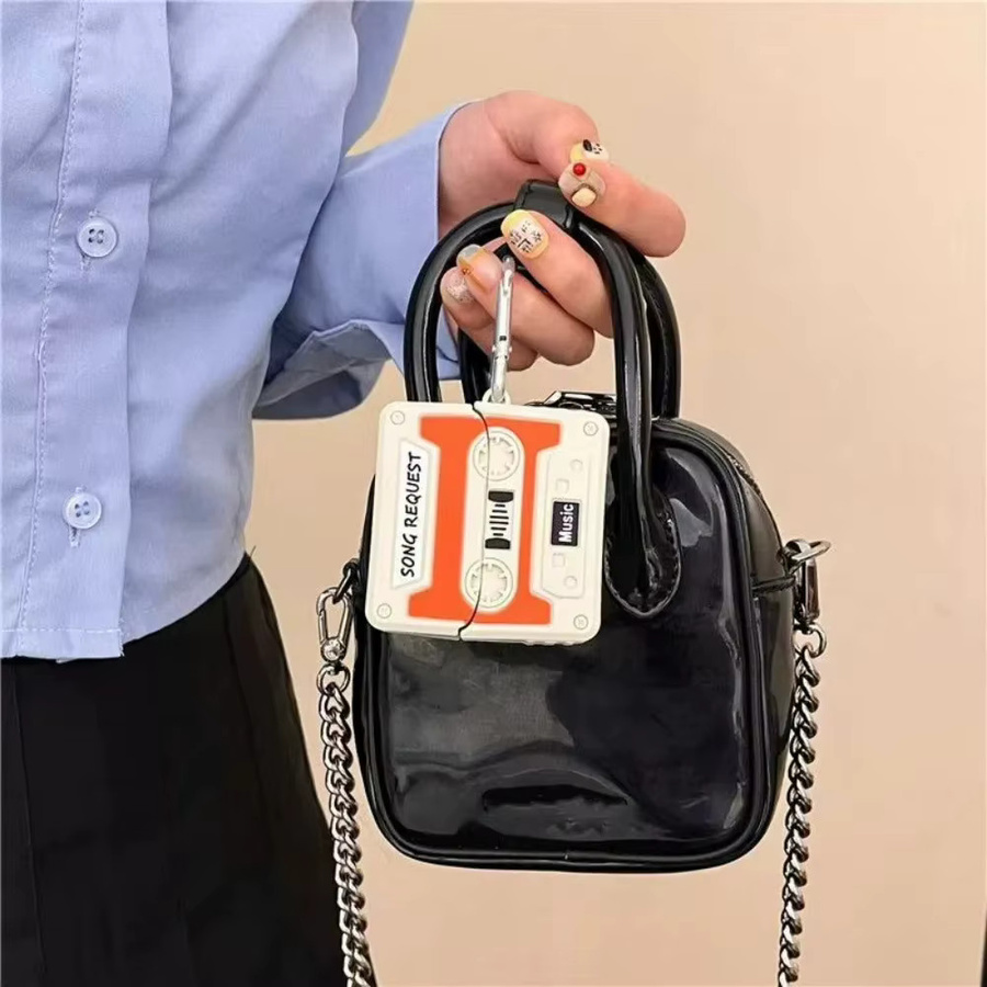 Samsung Galaxy Buds 3 und Buds 3 Pro Schutzhülle im Kassettenband-Design mit Karabiner, Orange - Bild 1