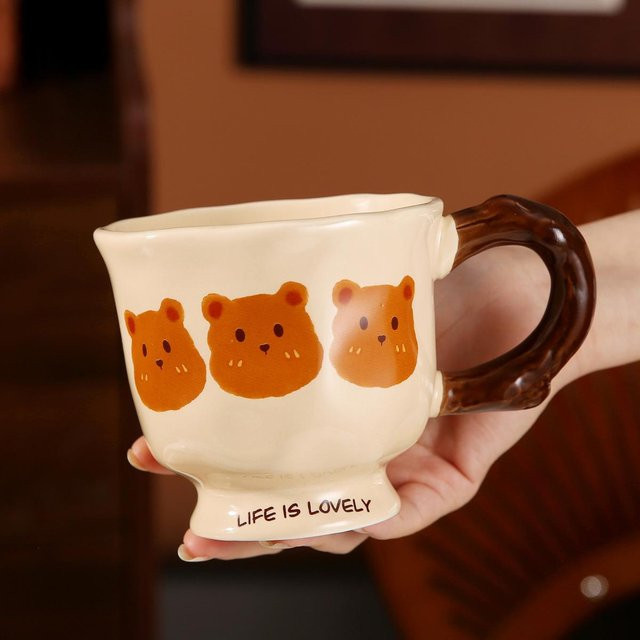 Yiran toy 1 Keramikbecher mit Löffel in Weiß, 350 ml - Bild 1