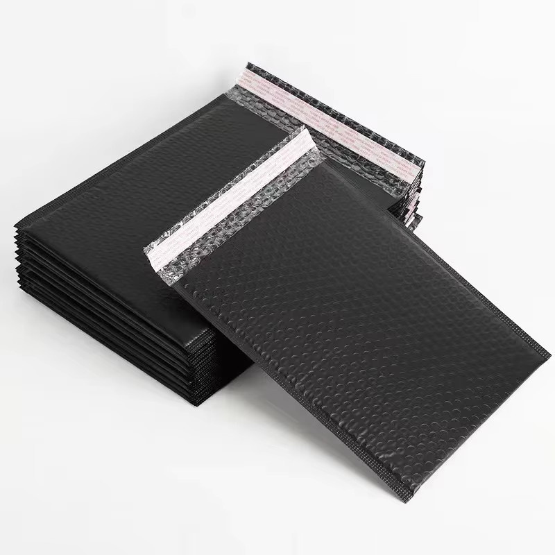 Selbstklebende Schaumstoff-Versandtaschen mit Luftpolsterfolie in Schwarz und Weiß - Bild 2
