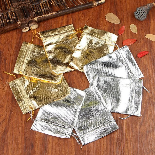 50er Set Geschenkbeutel aus Folie in Silber und Gold mit Kordelzug für Weihnachten und Hochzeiten - Bild 1