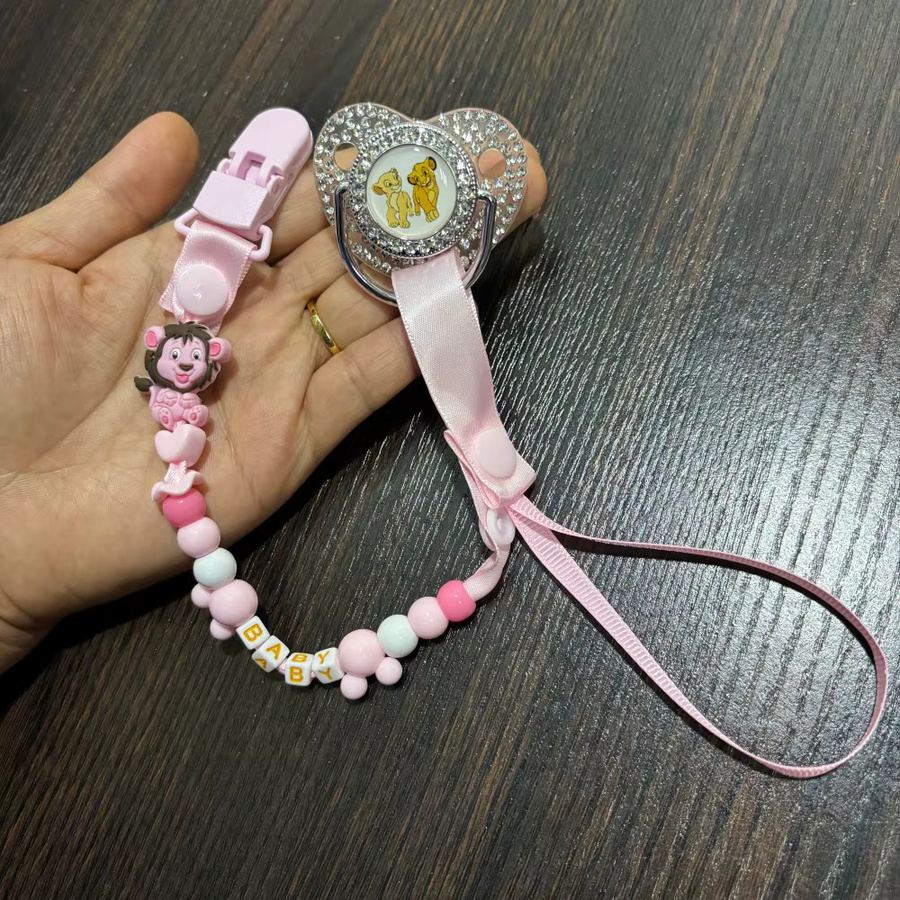 Disney Neugeborenen-Schnuller Set aus Silikon mit Schutzkappe und Schnullerhalter in Pink - Bild 2