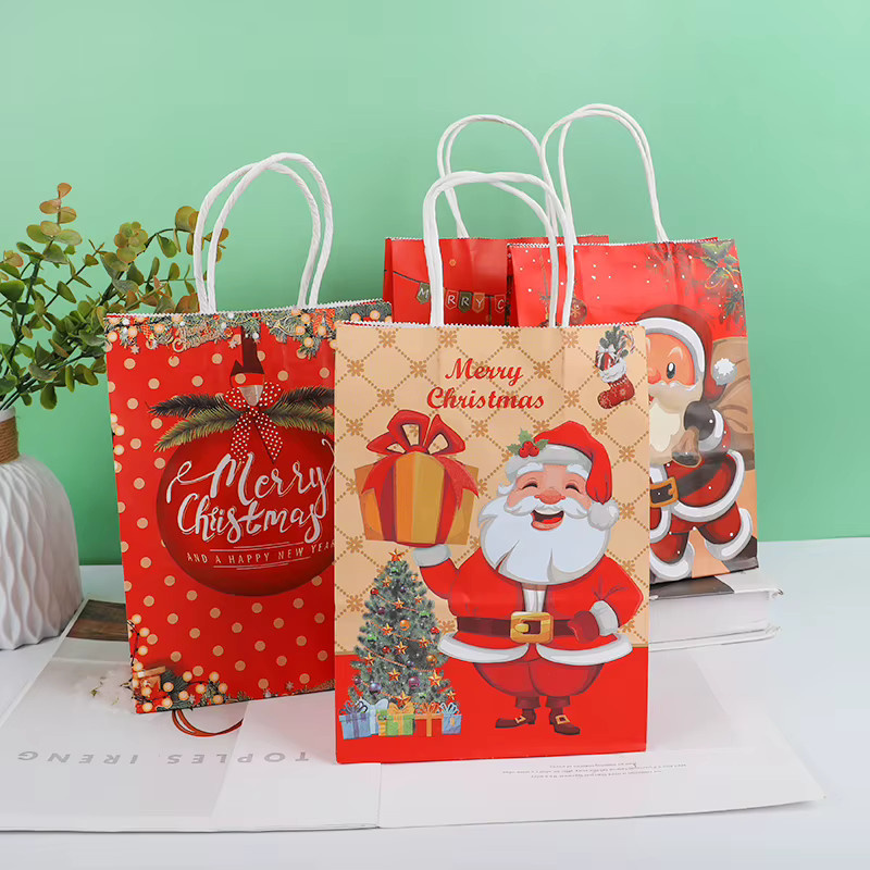 4er-Set ZQNYCY Kraftpapier-Geschenktüten mit Weihnachtsmann und Elch Motiv für Süßigkeiten und Kekse - Bild 1