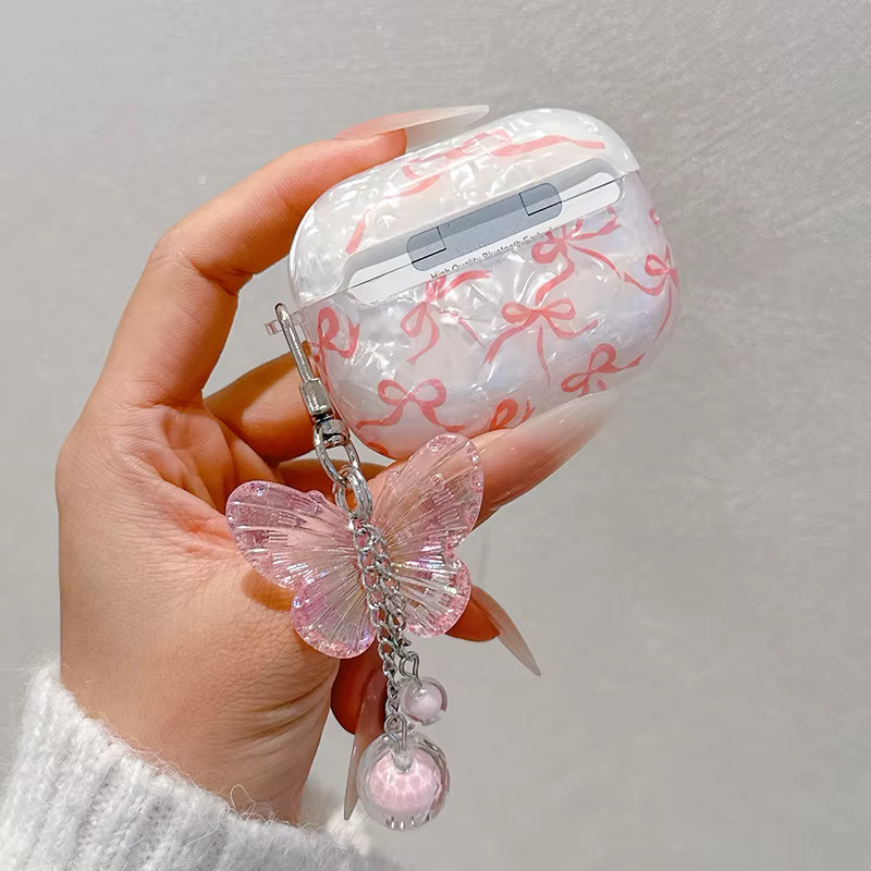 Schutzhülle mit Glitzer-Schleifenmuster und Kristall-Design für Apple AirPods Pro 2, 2. Generation sowie AirPods 1, 2, 3 und 4, transparent/beige - Bild 2