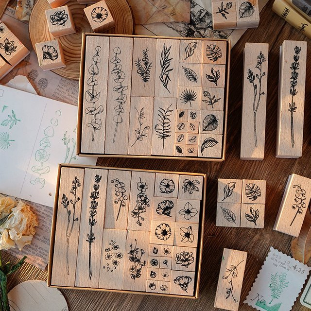 22 Stück Holzstempel mit verschiedenen Pflanzen- und Blattformen in Braun für DIY Scrapbooking und handgefertigte Alben - Bild 1