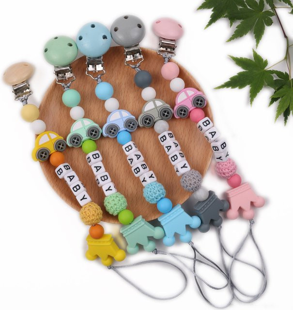 Panplay Schnullerclip für Babys aus Holz und Silikon mit Auto-Perlen als Beißring und Halterung - Bild 1
