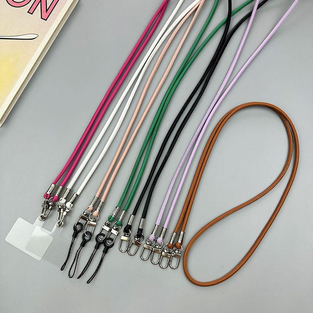 INS Leder-Handyband in Schwarz als Umhängeband und Lanyard für iPhone, Samsung oder Kamera - Bild 1