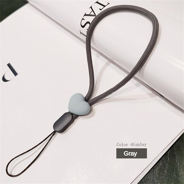 NATAWA Anti-Verlust-Telefon-Lanyard mit Cartoon-Design, elastisches Telefon-Seil für Unisex, Farbe: Grau - Bild 1