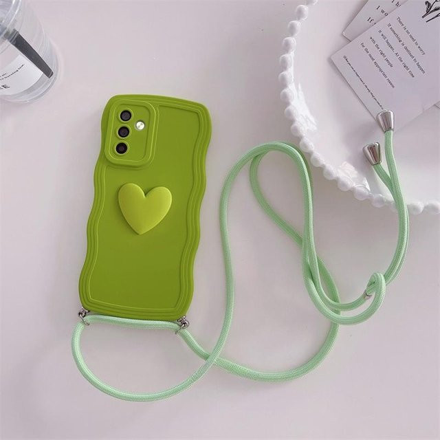 Silikonhülle mit lockigem Crossbody Lanyard und 3D Love Heart Design für Samsung Galaxy S24 S23 S22 S21 Ultra S23 FE A54 A34 A14 A15 A25 A35 A55 A05 in Grün - Bild 1