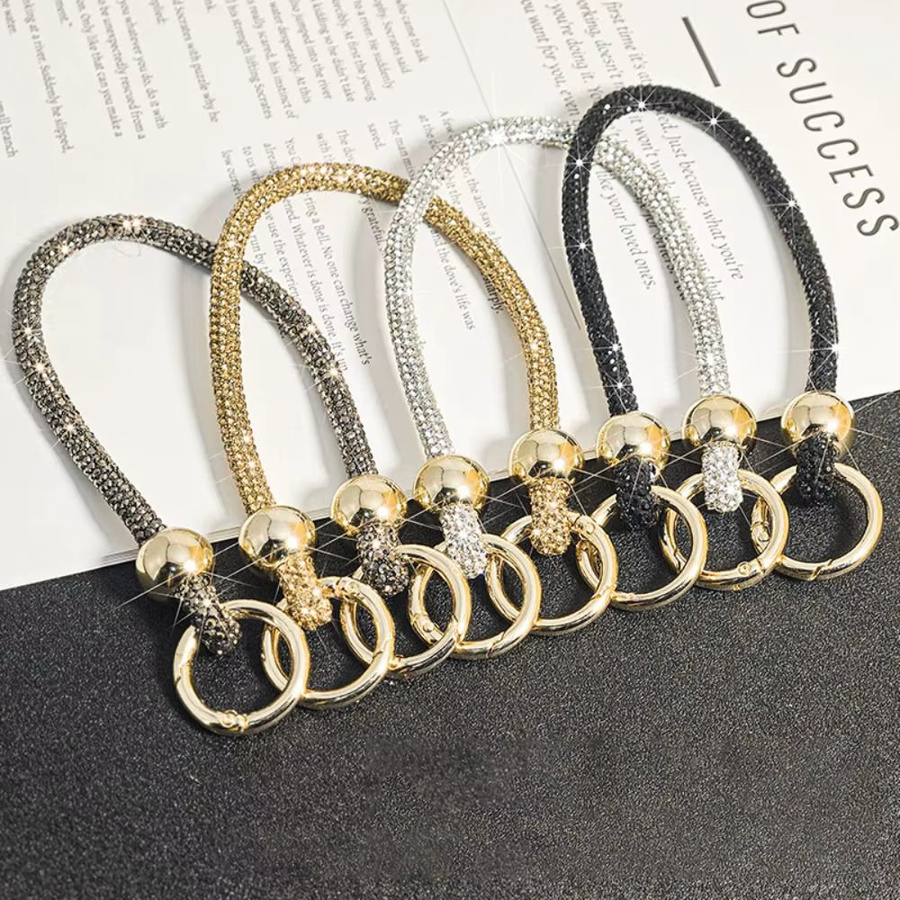 Luxus Kristall Strass Telefon Lanyard in Gold als Bling Bling Anti-Verlust Kette und Zubehör für dein Smartphone - Bild 1