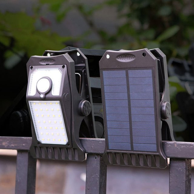 Wasserdichte LED Solar Clip Lampe mit Bewegungssensor für Garten und Camping in Schwarz und Weiß - Bild 1