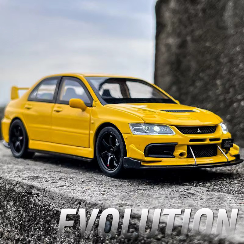 Maisto Mitsubishi EVO Modell, 1:32, Metall, Weiß, Gelb - Bild 1