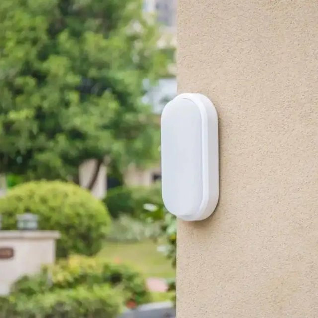 Moderne ovale LED Wandleuchte in Weiß für Innen und Außen, feuchtigkeitsbeständig für Badezimmer, Veranda und Flur - Bild 1