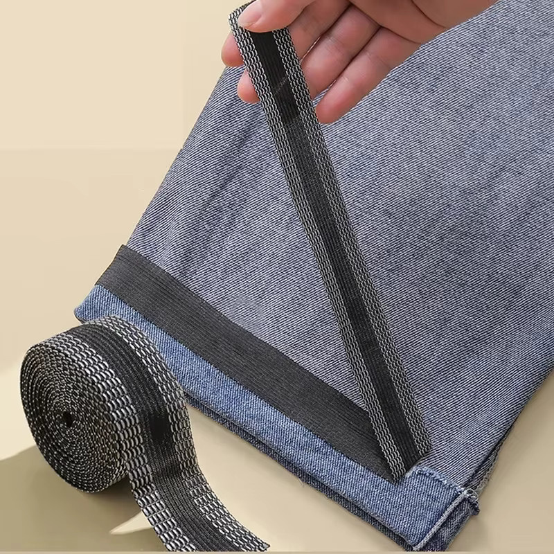 Selbstklebendes Nähband zum Aufbügeln für Hosenkanten und Säume in Grau - Bild 1