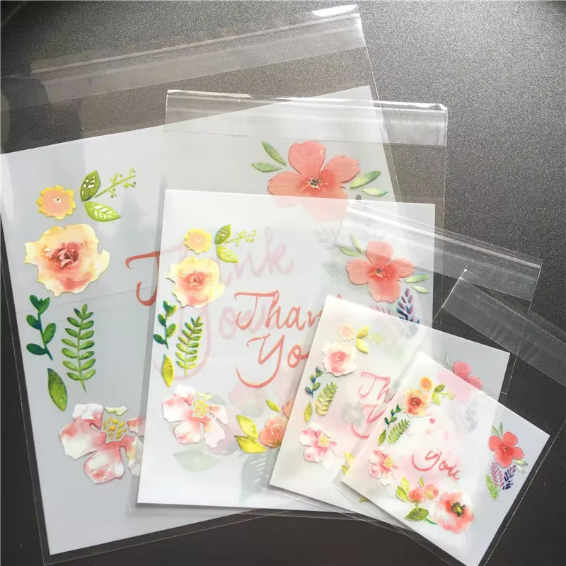 PEIPINGKE Selbstklebende Blumen-Plastikbeutel für Keksverpackungen und Geschenke, 100 Stück, Mehrfarbig - Bild 1