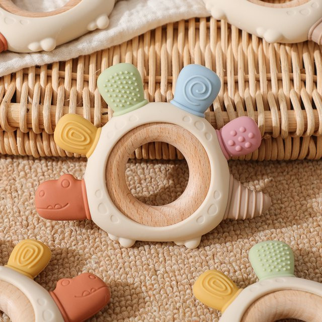 bite bites Baby Beißring Dinosaurier aus Silikon und Holz, bpa-frei, mehrfarbig - Bild 1