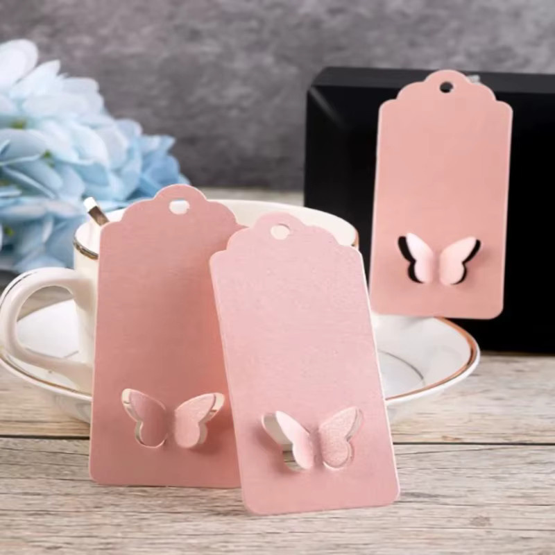 100 Stück Geschenkverpackungsetiketten aus Papier mit Schmetterlingsflügeln und gewelltem Rand in Weiß und Pink - Bild 3