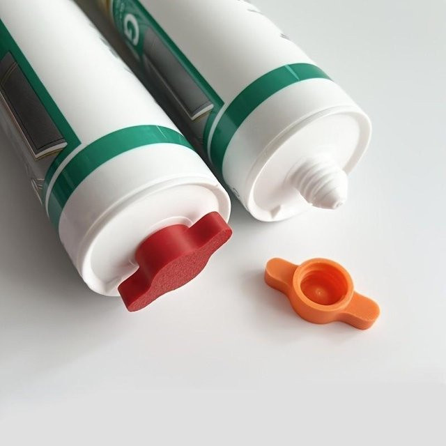 ESHYLALA 10 Stück Glas-Klebekappen in Orange aus Kunststoff für Standard-Kleberflaschen - Bild 1
